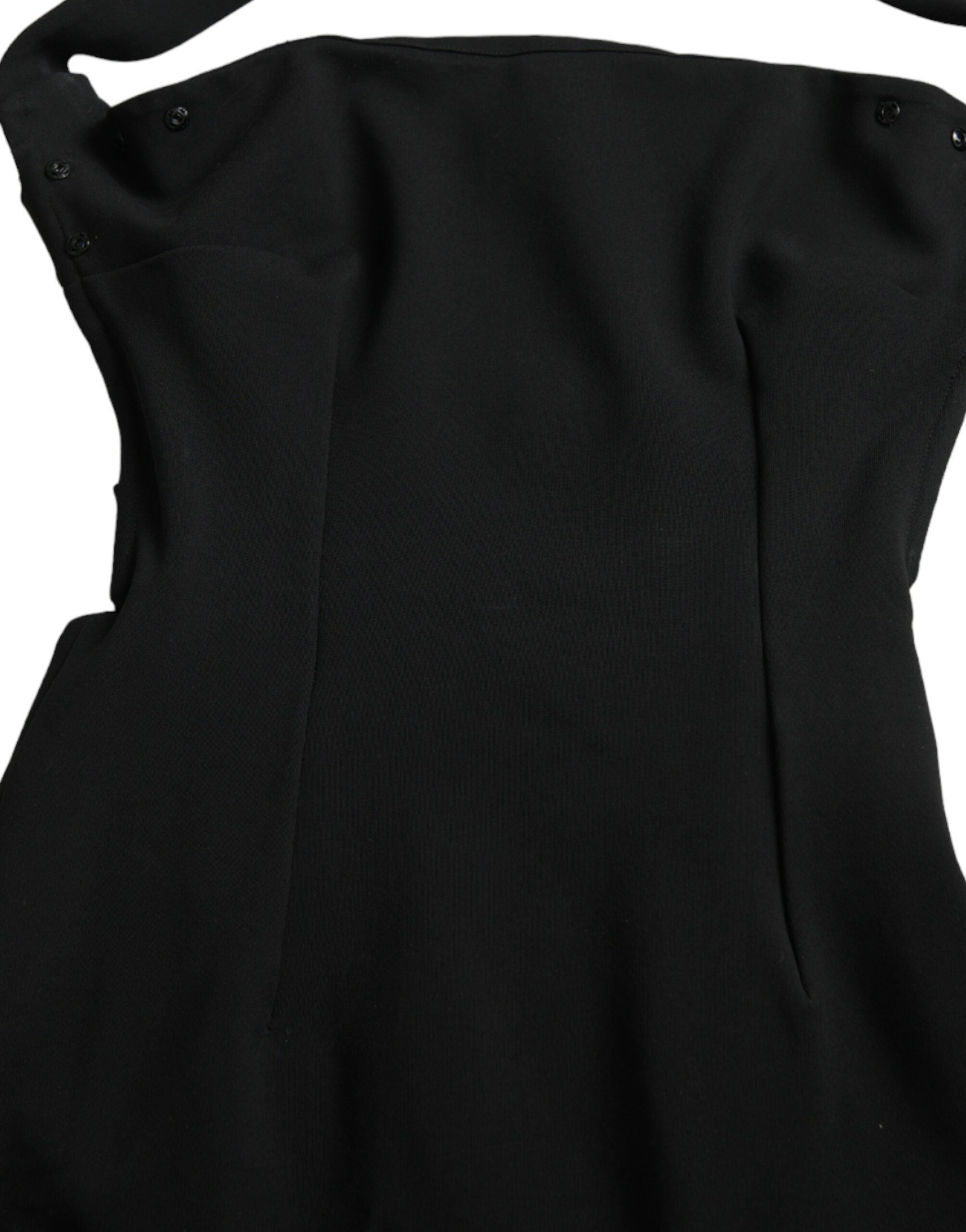 Black sheath halter sleeveless midi dress by Dolce & Gabbana, shown on a model with a fitted silhouette and elegant design.