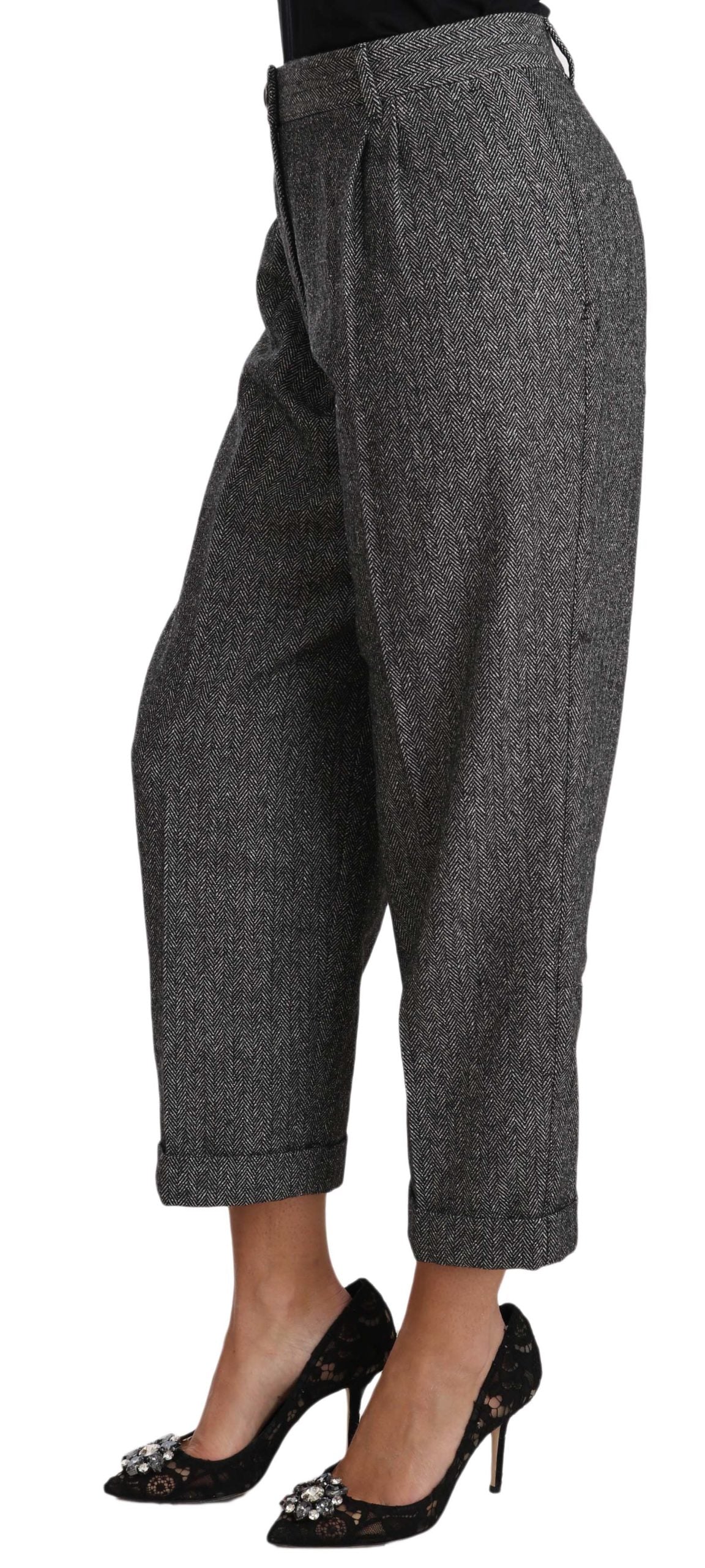 Gray wool pleated cropped trousers by Dolce & Gabbana, showing a tailored fit with pleats and cropped length.