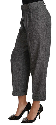 Gray wool pleated cropped trousers by Dolce & Gabbana, showing a tailored fit with pleats and cropped length.