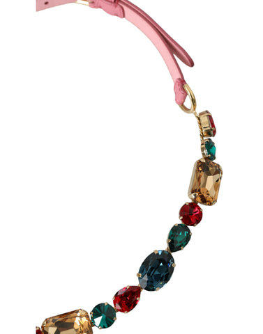 Pink leather belt with crystal chain embellishments from Dolce & Gabbana, featuring a stylish and luxurious design.