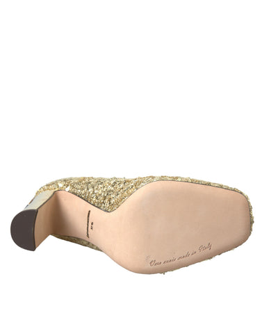 Gold sequin crystal heels pumps by Dolce & Gabbana with sparkling embellishments and elegant pointed toe design.