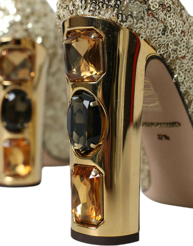 Dolce & Gabbana gold sequin crystal heels pumps shoes with pointed toe and stiletto heel on stylish runway display