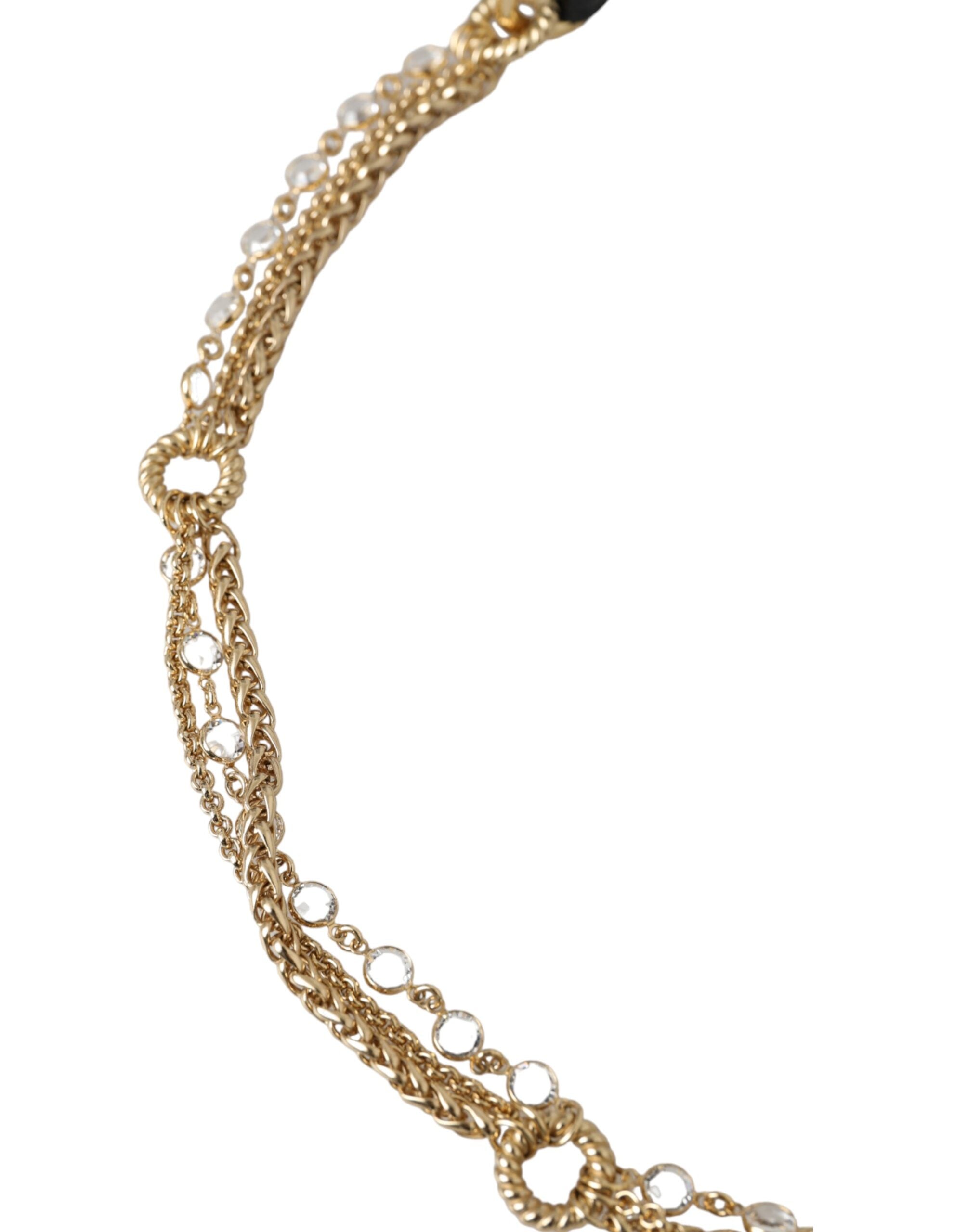 Black leather waist belt by Dolce & Gabbana featuring a gold chain and crystal embellishments for women.