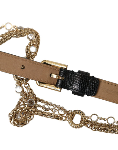 Black leather waist belt with gold chain and crystal accents for women by Dolce & Gabbana, featuring a stylish and luxurious design.