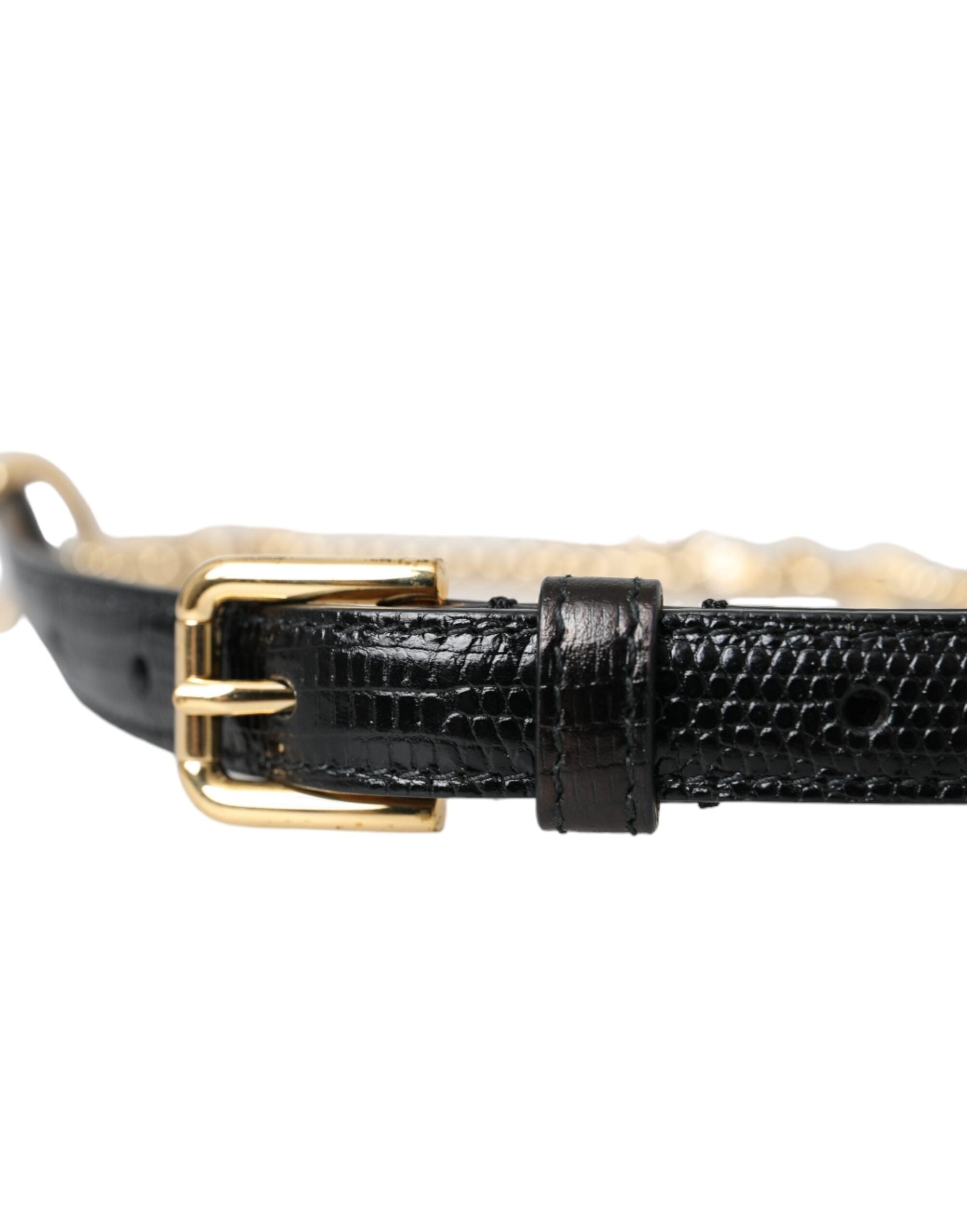 Black leather waist belt with gold chain and crystal accents for women, by Dolce & Gabbana, shown on a model.