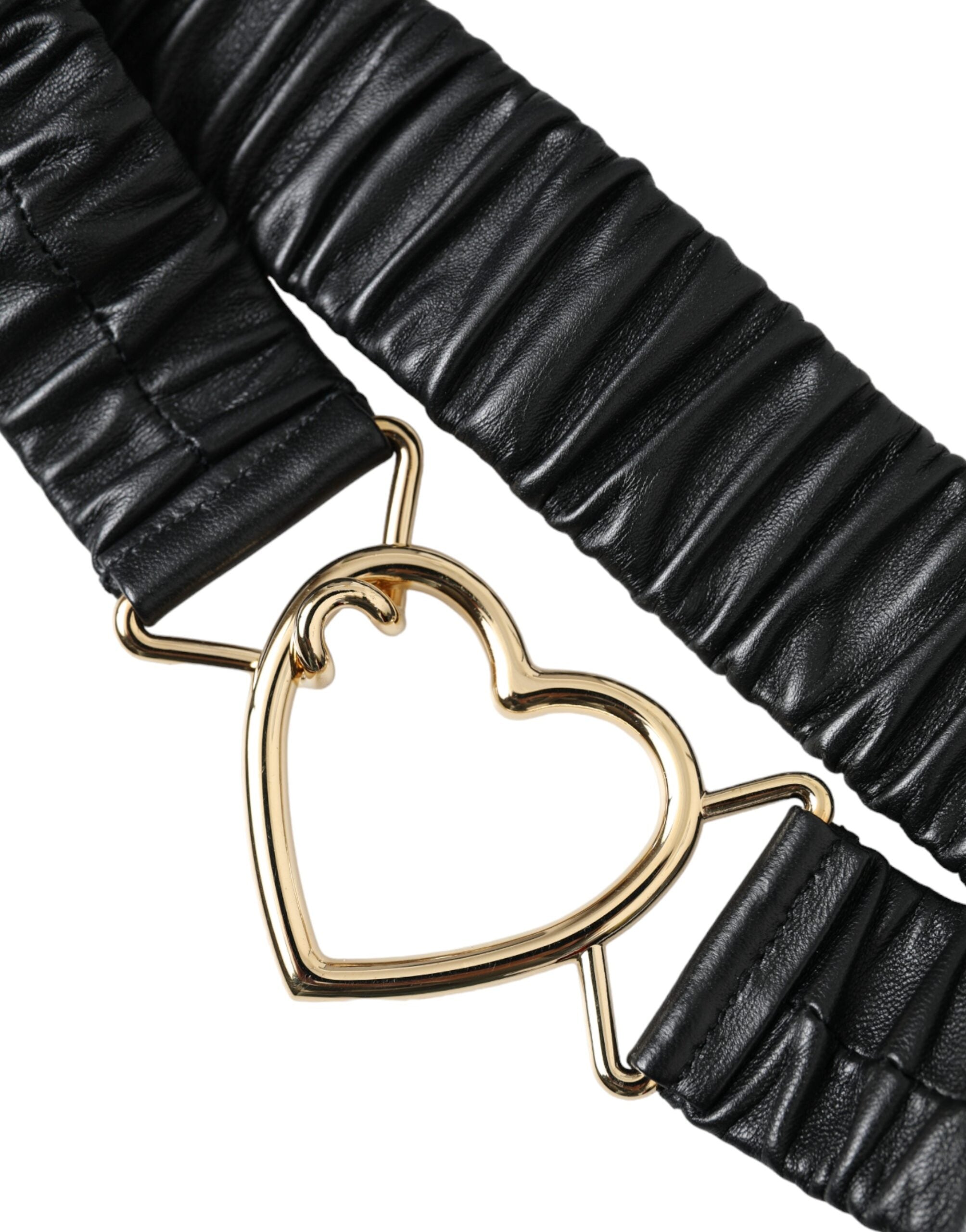 Black leather belt with gold heart-shaped metal buckle from Dolce & Gabbana, featuring a sleek and stylish design.