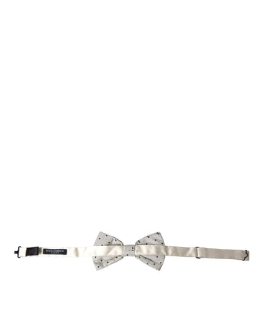 White and black polka dot polyester bow tie for men by Dolce & Gabbana, featuring a classic bow shape and stylish pattern.