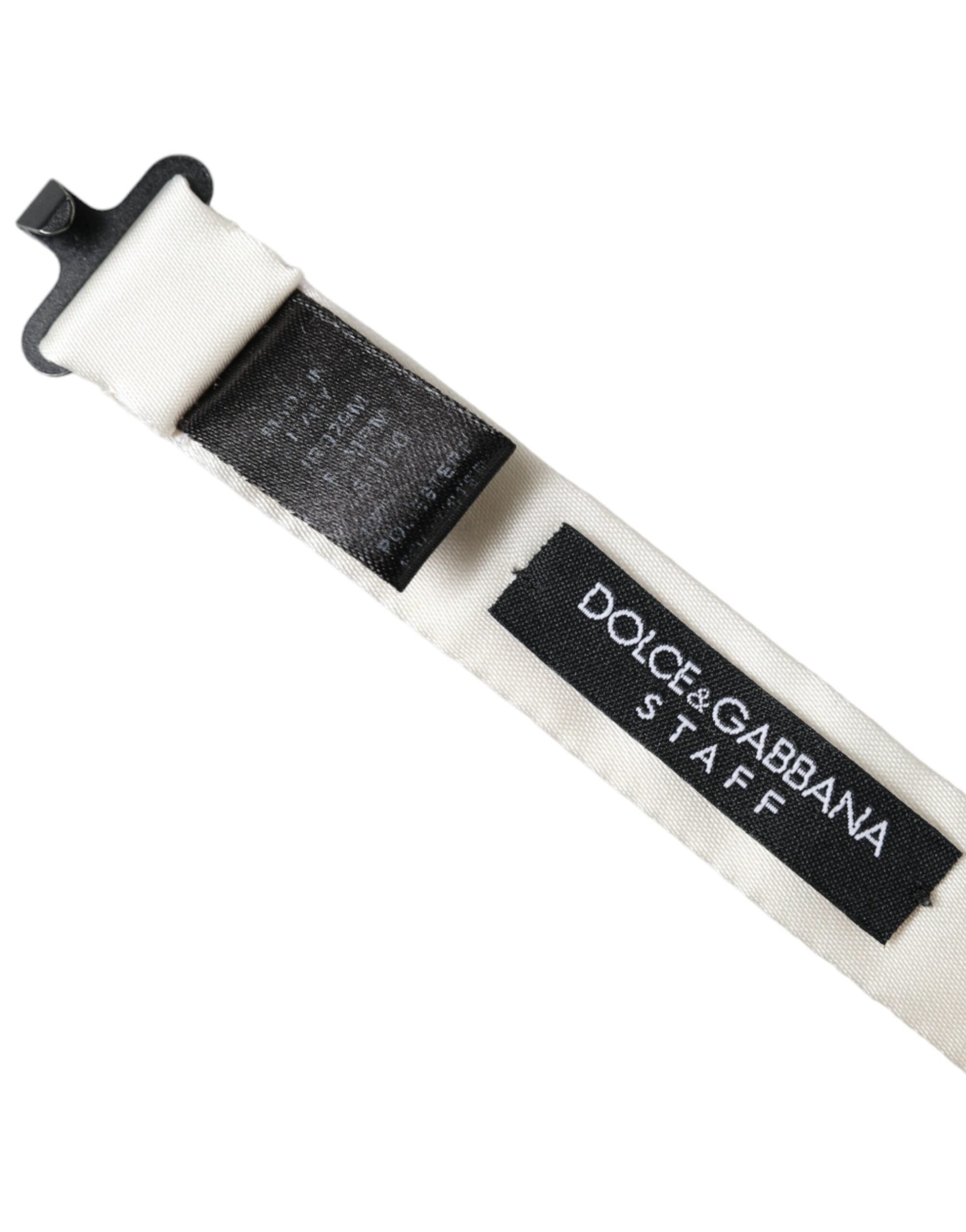 White and black polka dot polyester bow tie for men by Dolce & Gabbana, featuring a classic bow tie design.