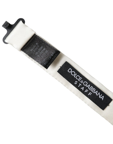 White and black polka dot polyester bow tie for men by Dolce & Gabbana, featuring a classic bow tie design.