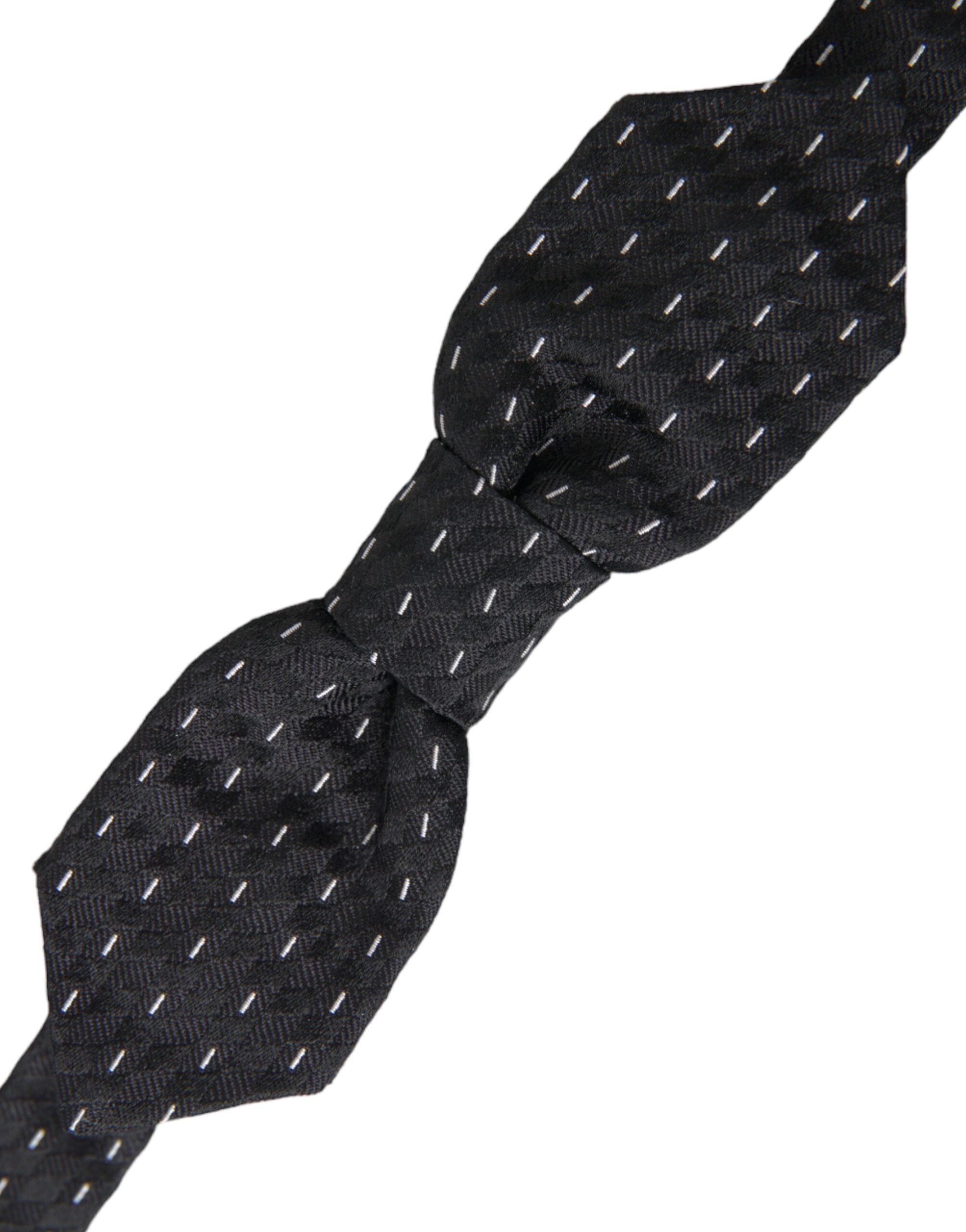 Black and white stitched silk men's neck bow tie by Dolce & Gabbana, featuring a classic elegant design.