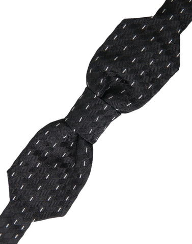 Black and white stitched silk men's neck bow tie by Dolce & Gabbana, featuring a classic elegant design.