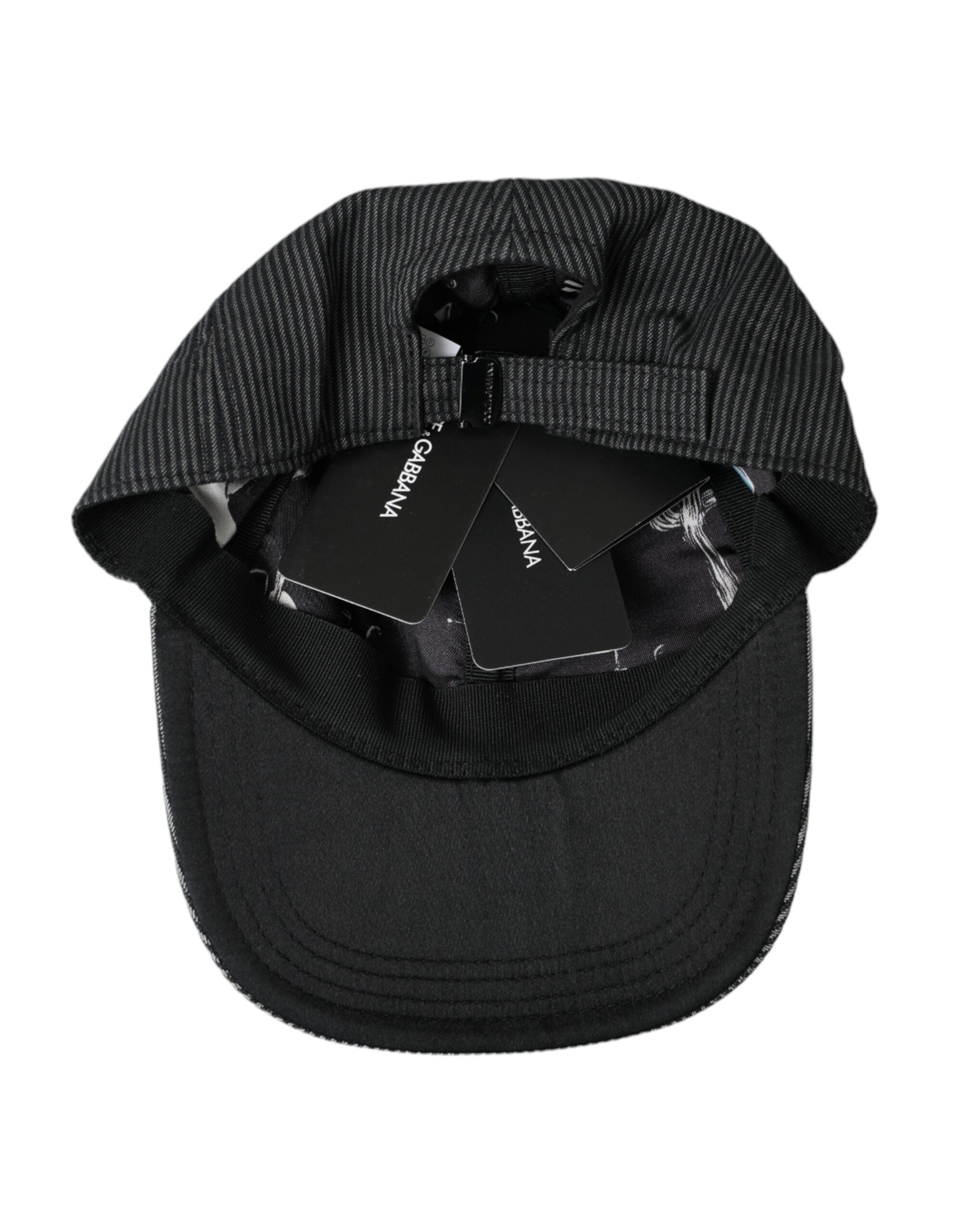 Black cotton embellished men's baseball hat by Dolce & Gabbana with decorative details and structured brim.