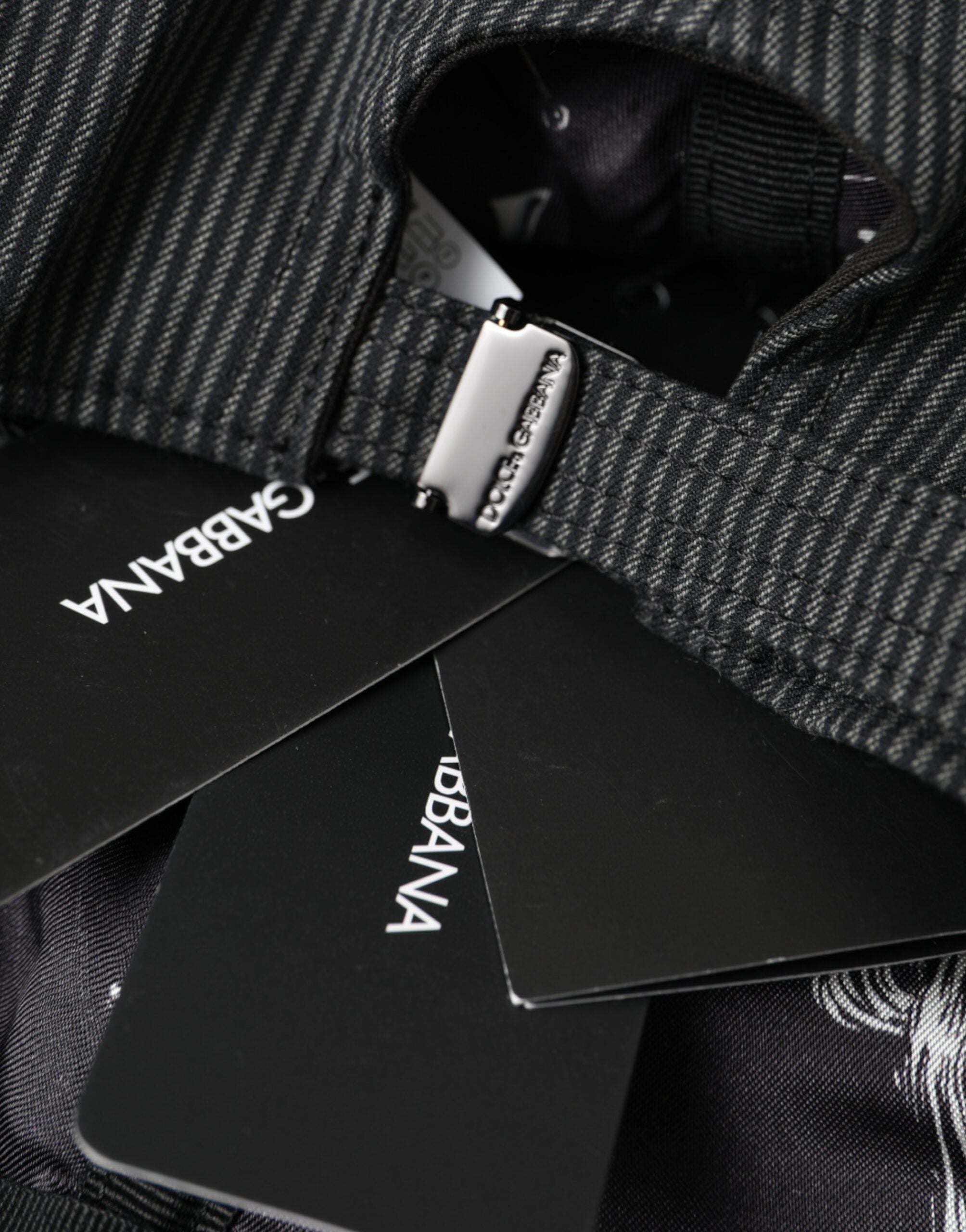 Black cotton embellished baseball hat for men by Dolce & Gabbana, featuring decorative details and a classic sporty style.