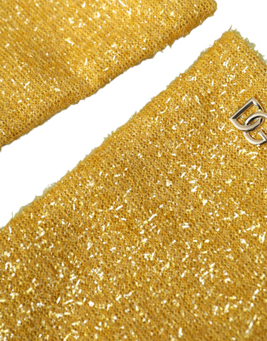 Gold Lurex Fantasia mid-arm length gloves by Dolce & Gabbana, featuring shiny metallic fabric and stylish design.
