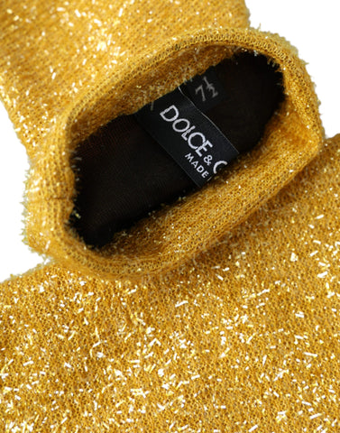 Gold Lurex Fantasia mid-arm length gloves by Dolce & Gabbana, featuring shiny metallic fabric and elegant design.