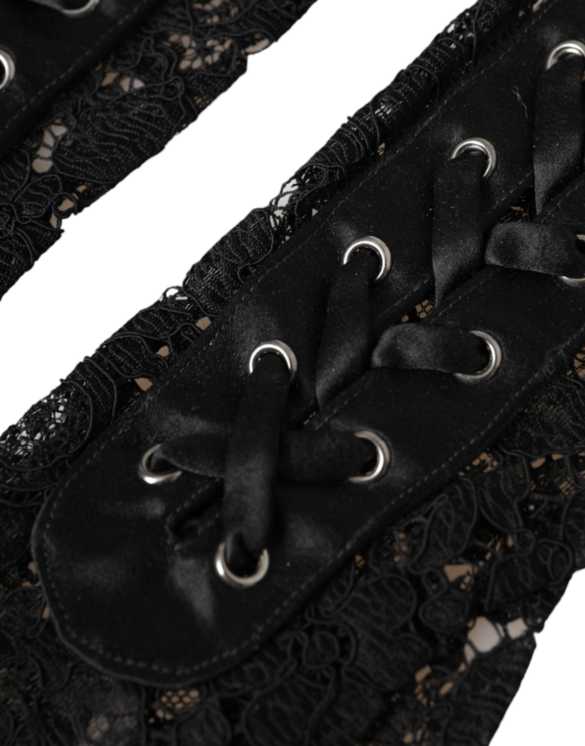 Black Taormina lace elbow length gloves by Dolce & Gabbana, featuring intricate lace detailing and a elegant fit.