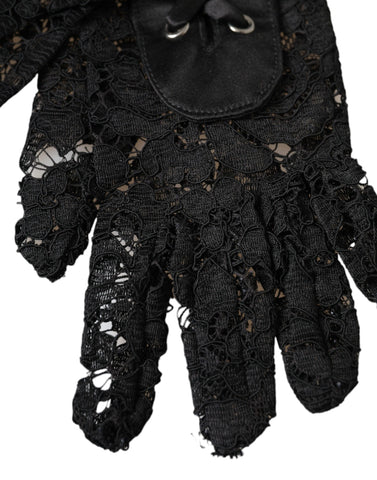 Black Taormina lace elbow-length gloves by Dolce & Gabbana, featuring intricate lace design and elegant fit.