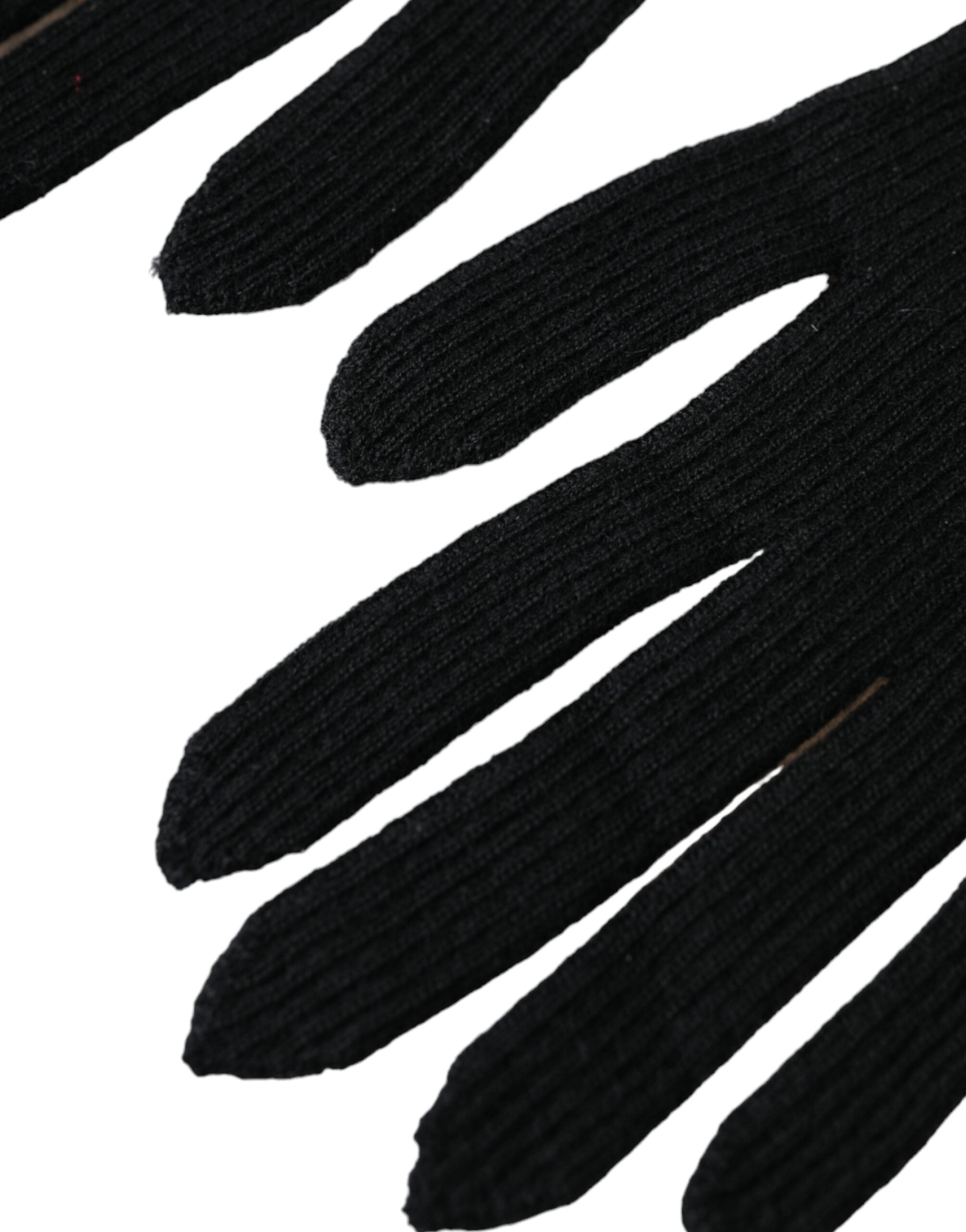 Black cashmere knitted elbow-length gloves by Dolce & Gabbana, showing detailed stitching and soft texture.