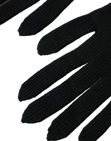 Black cashmere knitted elbow-length gloves by Dolce & Gabbana, showing detailed stitching and soft texture.