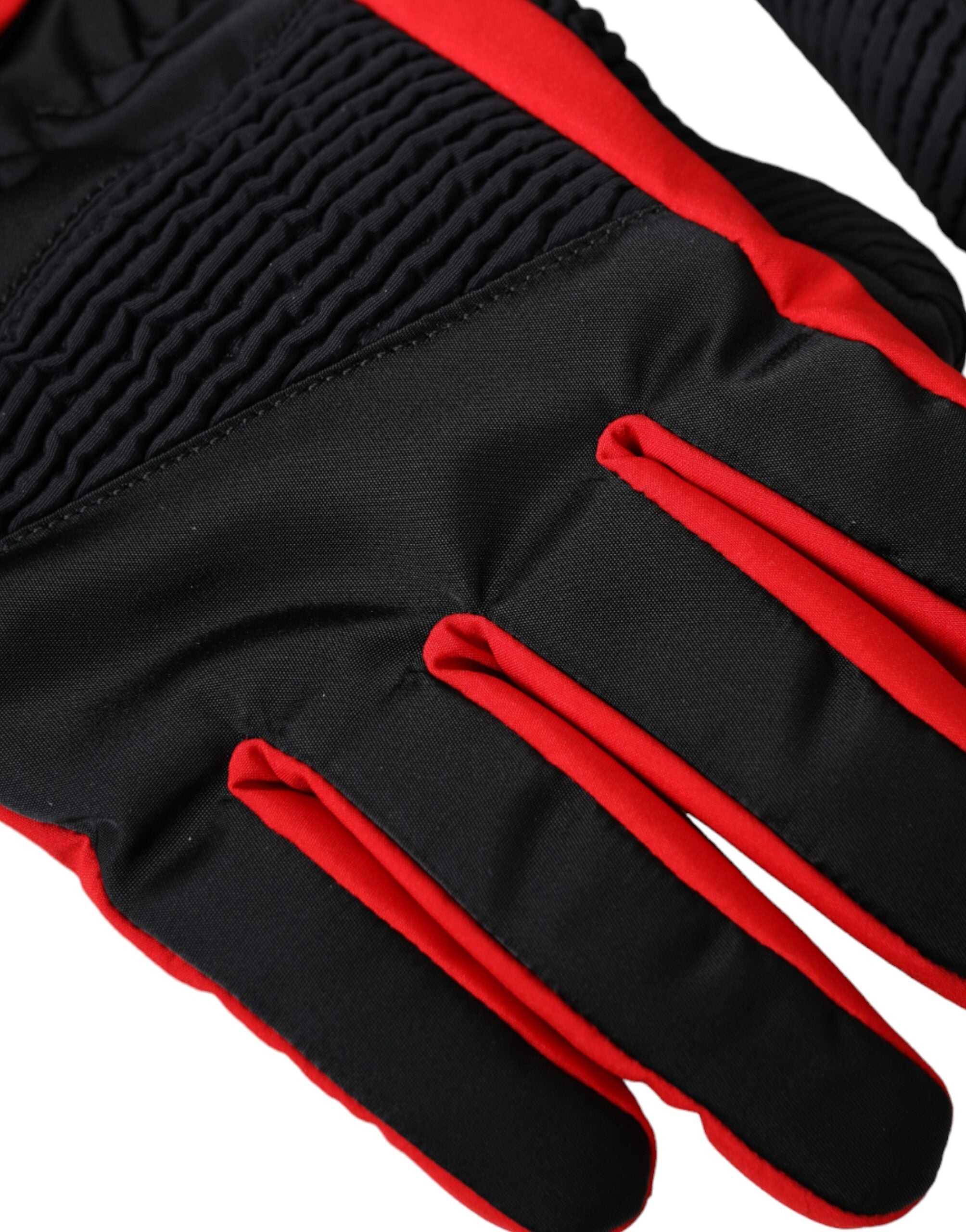Black and red nylon wrist-length gloves by Dolce & Gabbana, showing close-up of textured fabric and stylish design.