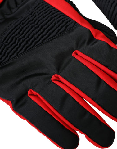 Black and red nylon wrist-length gloves by Dolce & Gabbana, showing close-up of textured fabric and stylish design.
