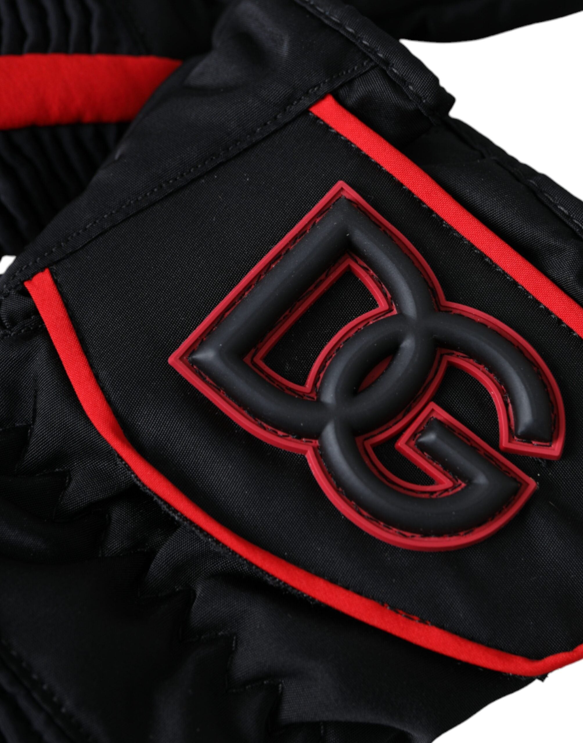 Black and red nylon wrist-length gloves by Dolce & Gabbana, featuring a sleek design and comfortable fit.