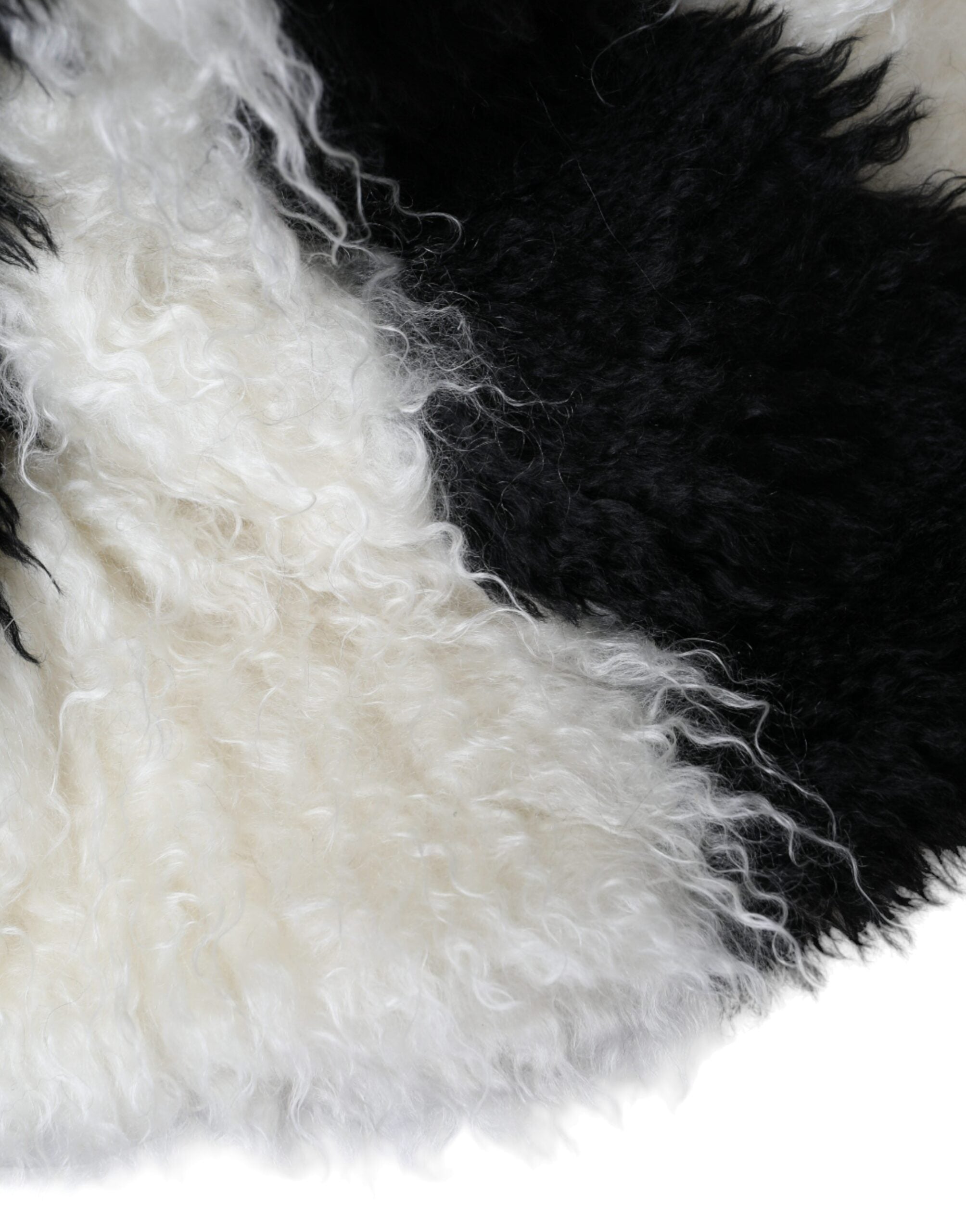 Black and white striped mohair fur bucket hat by Dolce & Gabbana, featuring a soft, textured design with a wide brim.