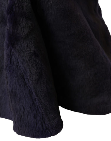 Black weasel fur head wrap hat by Dolce & Gabbana, showcasing a luxurious fur design and stylish headwear.