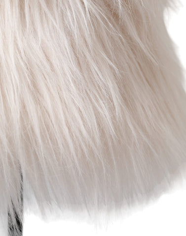White acrylic fur women's bucket hat by Dolce & Gabbana, featuring soft fur texture and stylish wide-brim design.