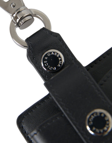 Black plain leather AirPods case by Dolce & Gabbana with silver metal accents, designed to protect and stylishly store AirPods.