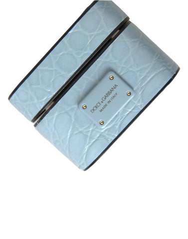 Light blue leather AirPods case with metal logo plaque by Dolce & Gabbana, featuring a sleek, stylish design.