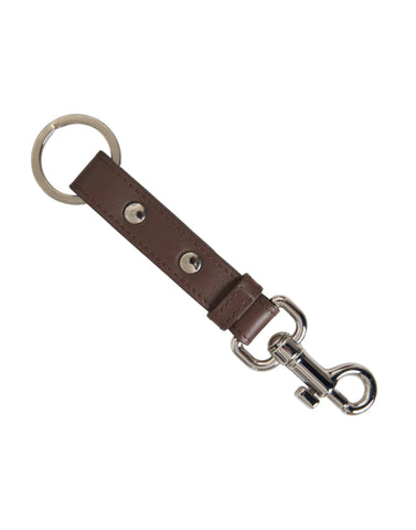 Brown leather keyring holder with silver brass keychain, featuring a plain design from Dolce & Gabbana.