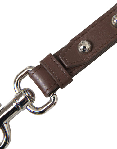 Brown plain leather keyring holder with silver brass keychain, stylish Dolce & Gabbana accessory for keys.