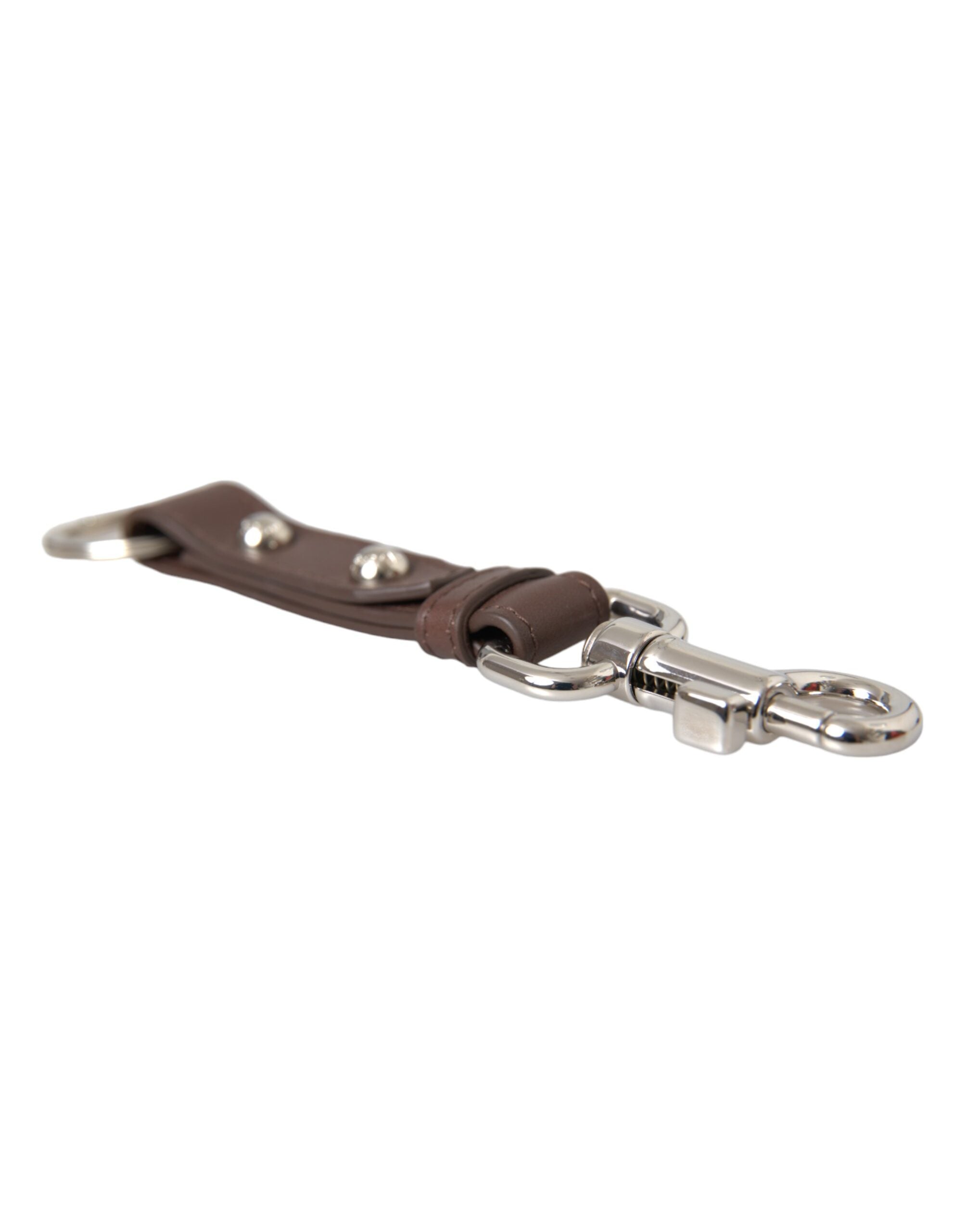 Brown plain leather keyring holder with silver brass keychain, designed by Dolce & Gabbana, featuring a sleek and minimalist style.