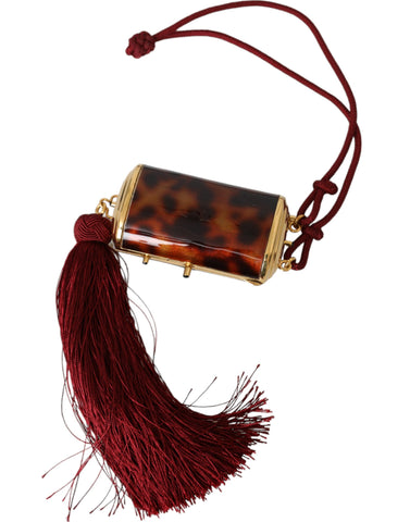 Brown leopard print mini mirror and tassel makeup holder bag by Dolce & Gabbana with decorative details.