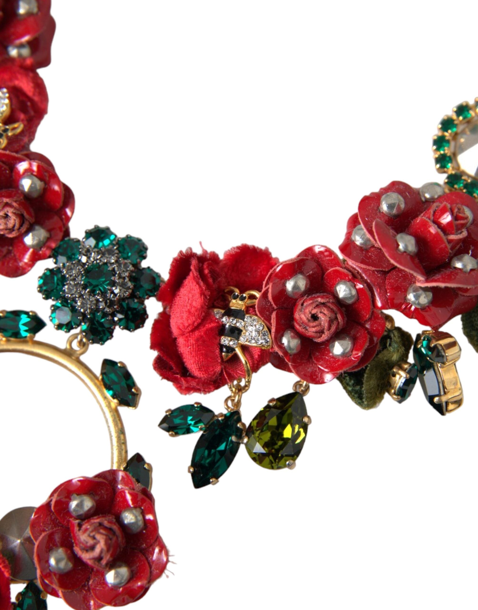 Gold brass link chain necklace with rose petal crystal pendant from Dolce & Gabbana displayed on a white background.