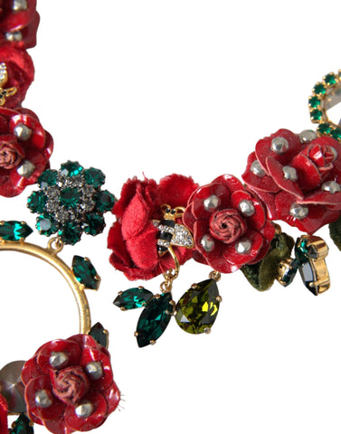 Gold brass link chain necklace with rose petal crystal pendant from Dolce & Gabbana displayed on a white background.