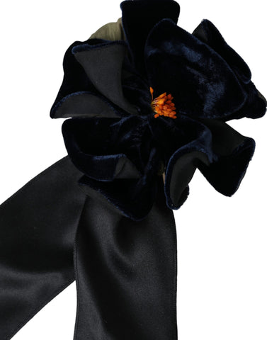 Black silk floral hair pin brooch with gold brass accents, designed by Dolce & Gabbana, featuring intricate floral detailing.