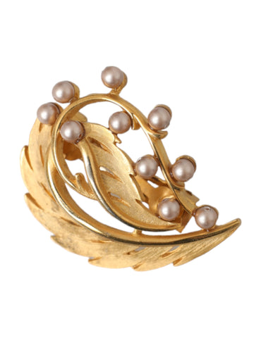Gold brass leaf-embellished jewelry brooch hair pin with intricate leaf design, by Dolce & Gabbana.