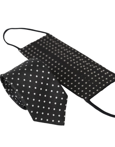 Black and white polka dot silk necktie face mask by Dolce & Gabbana, featuring a stylish polka dot pattern and smooth silk fabric.