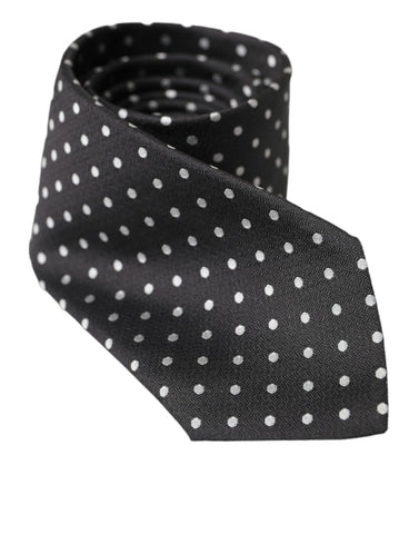 Black and white polka dot silk necktie face mask by Dolce & Gabbana with a smooth, luxurious fabric and stylish pattern.