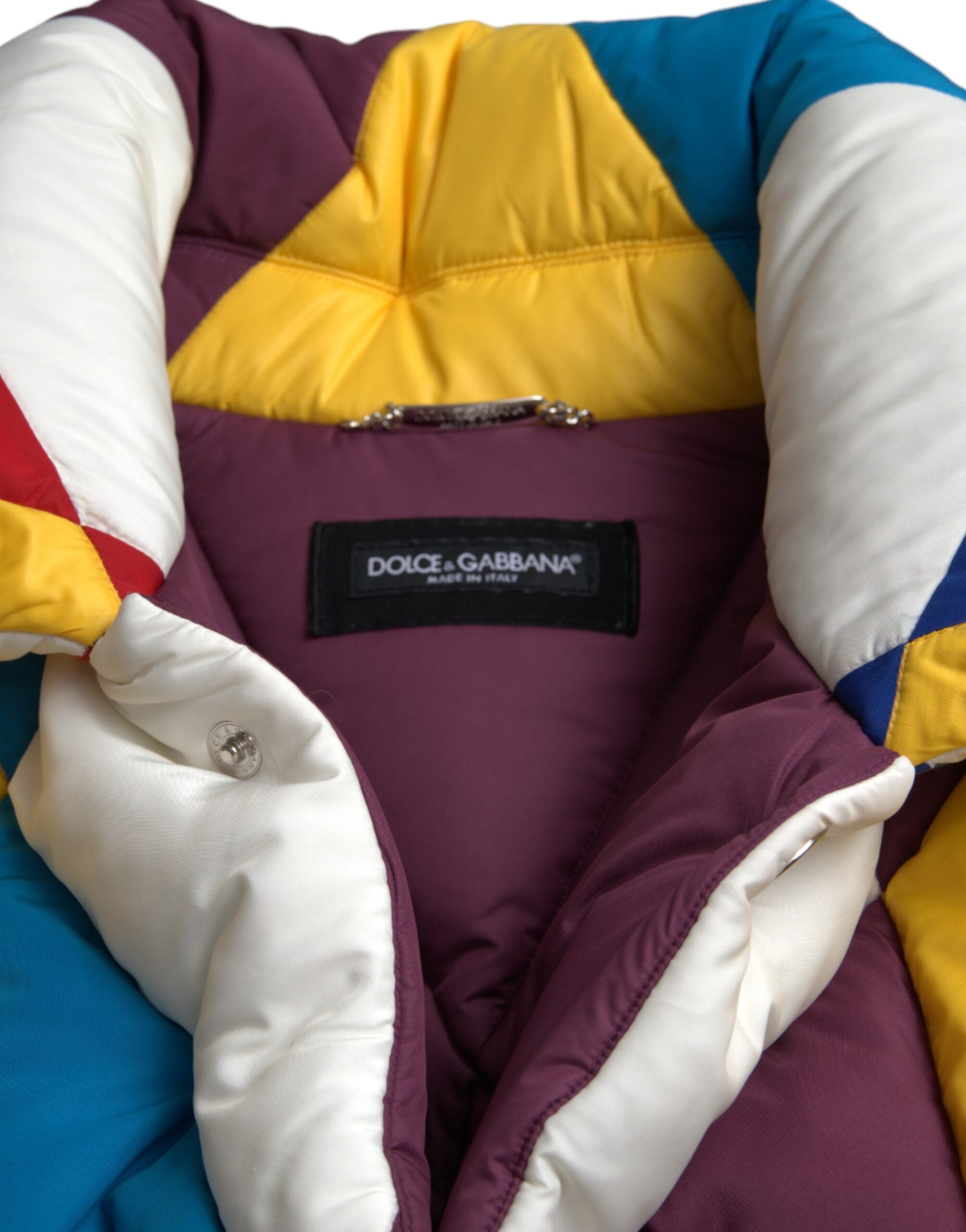 Men's multicolor puffer windbreaker jacket by Dolce & Gabbana, featuring a lightweight, quilted design with vibrant color blocks.