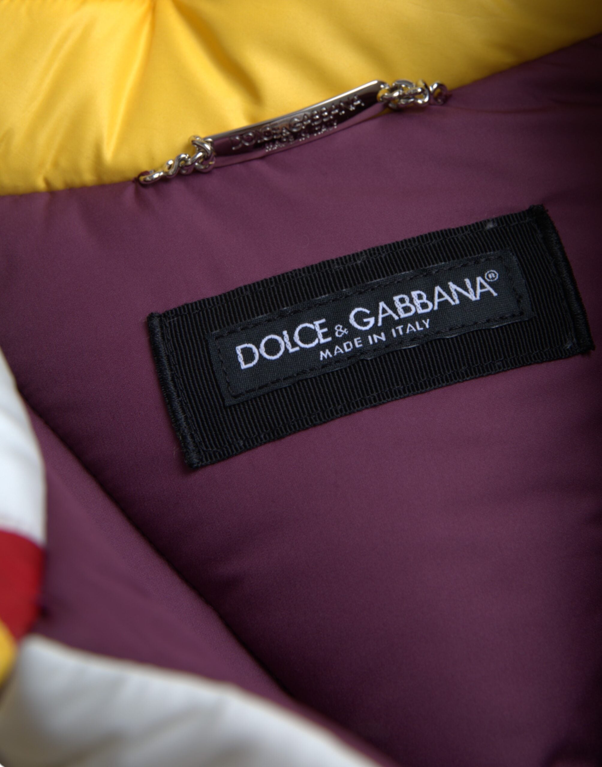 Multicolor Dolce & Gabbana men's windbreaker puffer jacket with a lightweight, stylish design and vibrant color blocks.