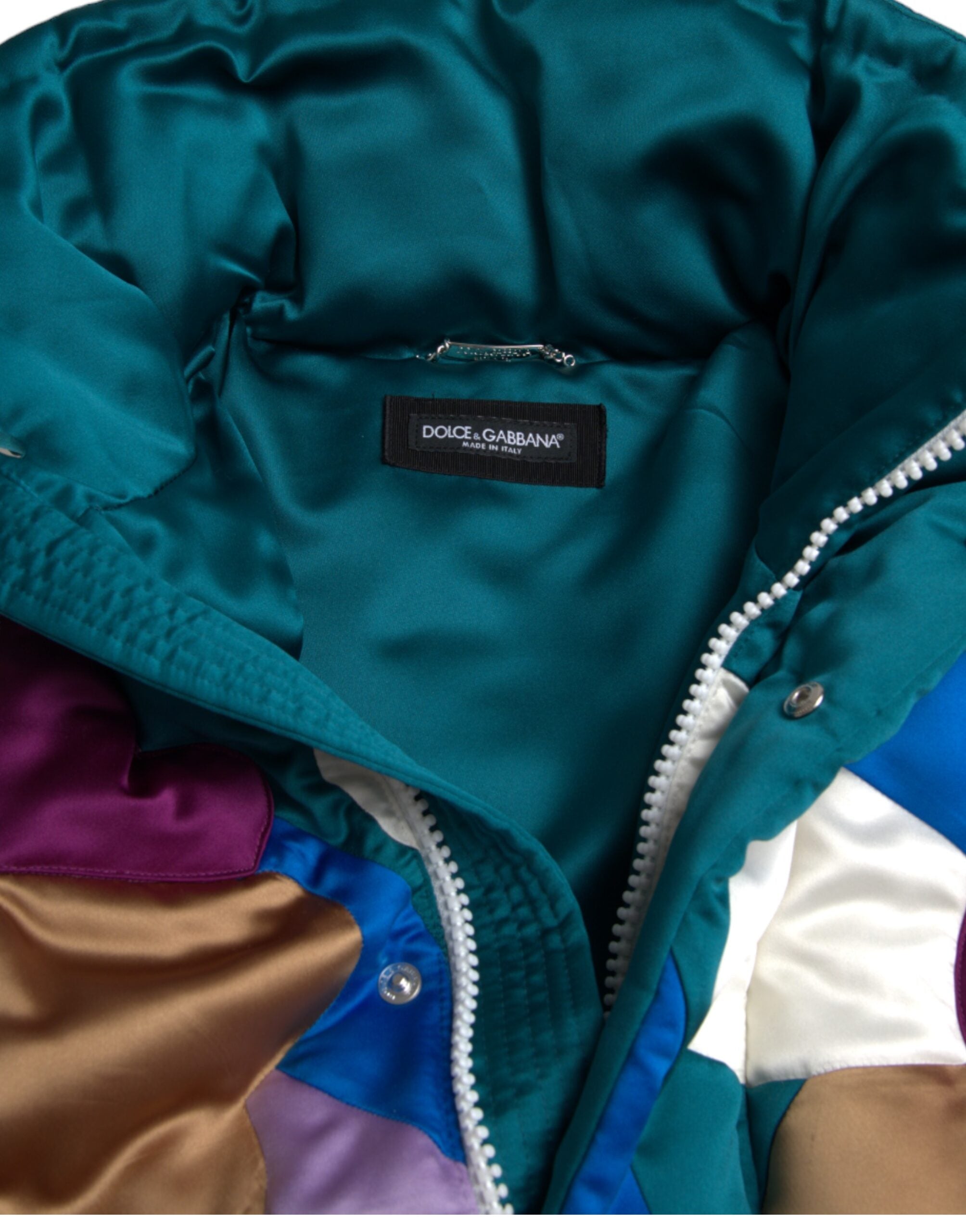 Multicolor floral Dolce & Gabbana puffer windbreaker jacket with vibrant floral patterns and a sporty, lightweight design.