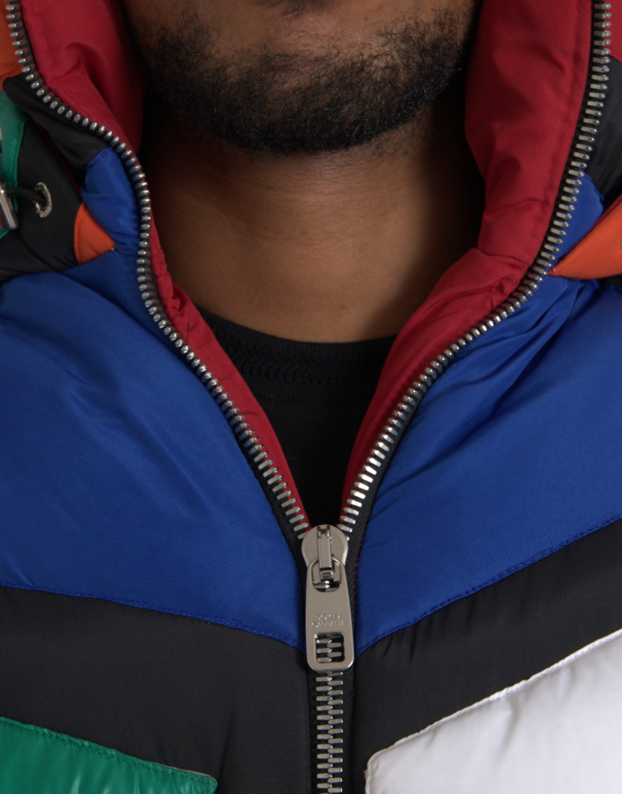 Multicolor quilted hooded puffer jacket by Dolce & Gabbana with a shiny finish and padded design for warmth and style.