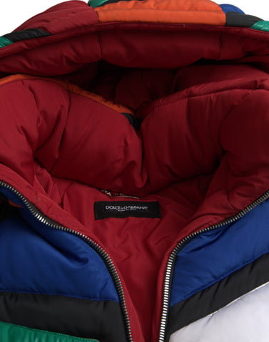 Multicolor quilted puffer jacket with hood by Dolce & Gabbana, showcasing vibrant patchwork design and padded texture.