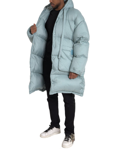 Light blue quilted hooded puffer jacket for men by Dolce & Gabbana, showcasing its stylish padded design and hooded collar.