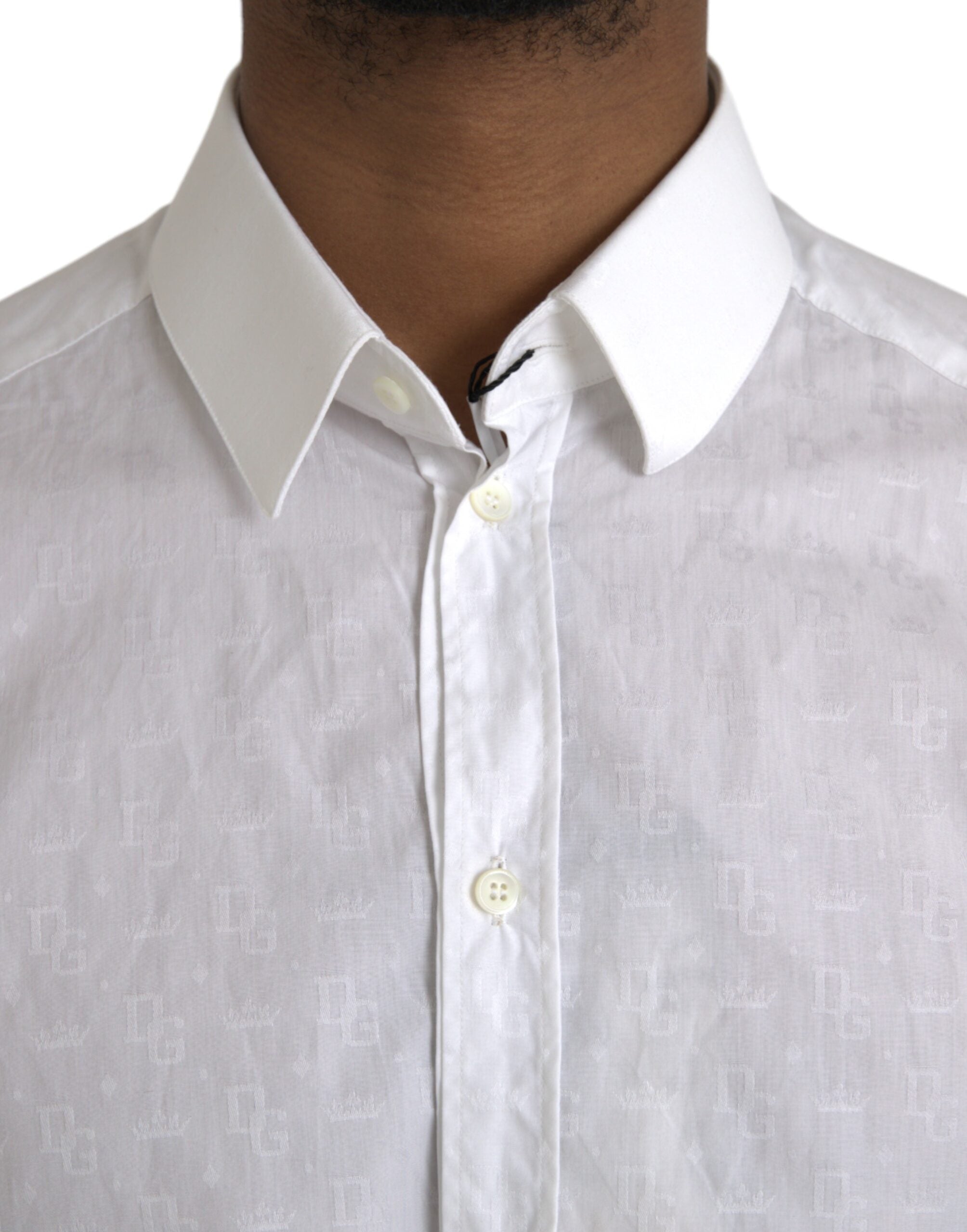 White cotton long sleeve dress by Dolce & Gabbana with gold accents and a classic, elegant fit.