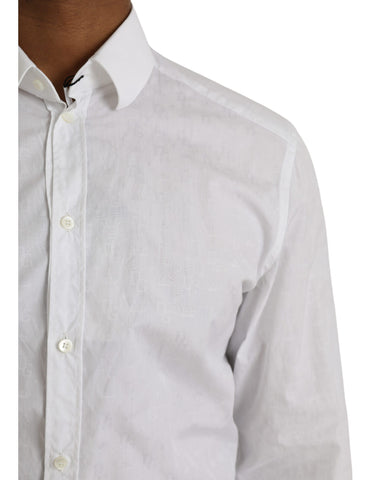 White cotton long sleeve dress by Dolce & Gabbana, featuring a gold shirt design and elegant, flowing fabric.