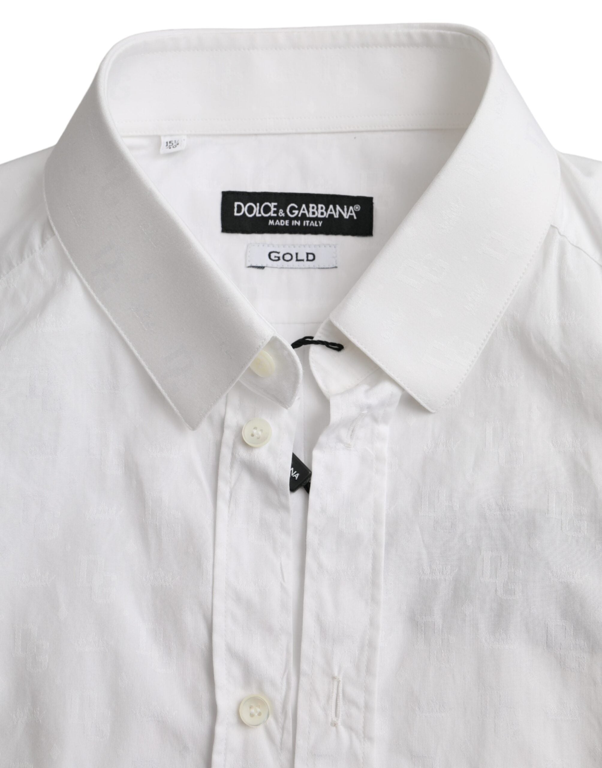 White cotton long sleeve dress by Dolce & Gabbana featuring a gold shirt detail and elegant, feminine design.